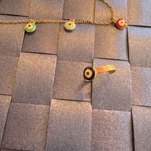 Joan Rivers “evil eye” bracelet and ring